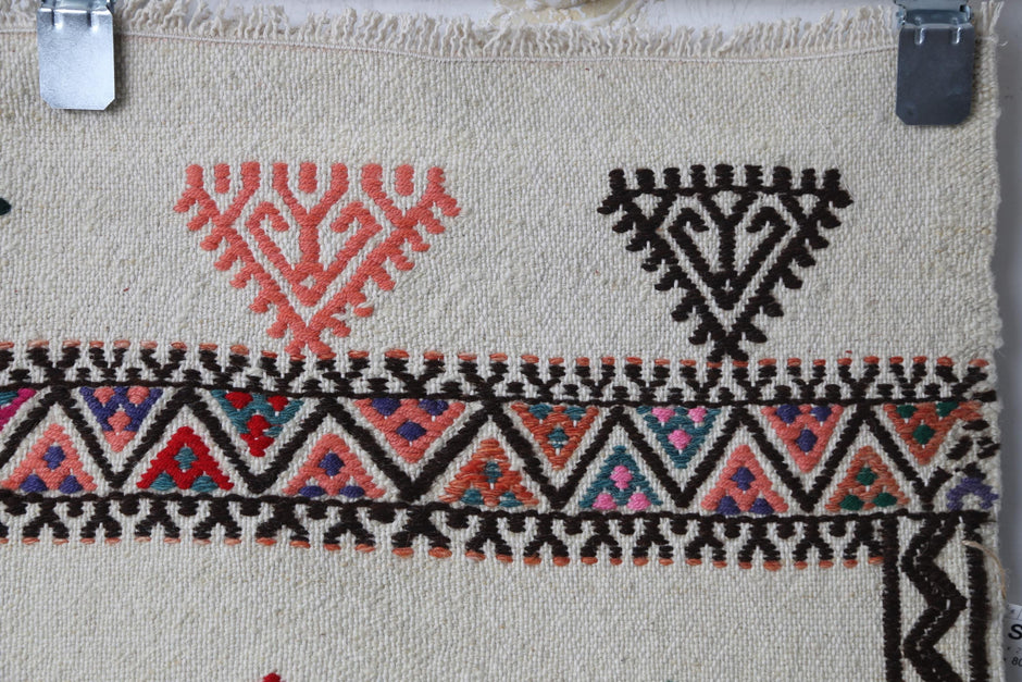 Geometric tribal design, alt angle, beige kilim rug