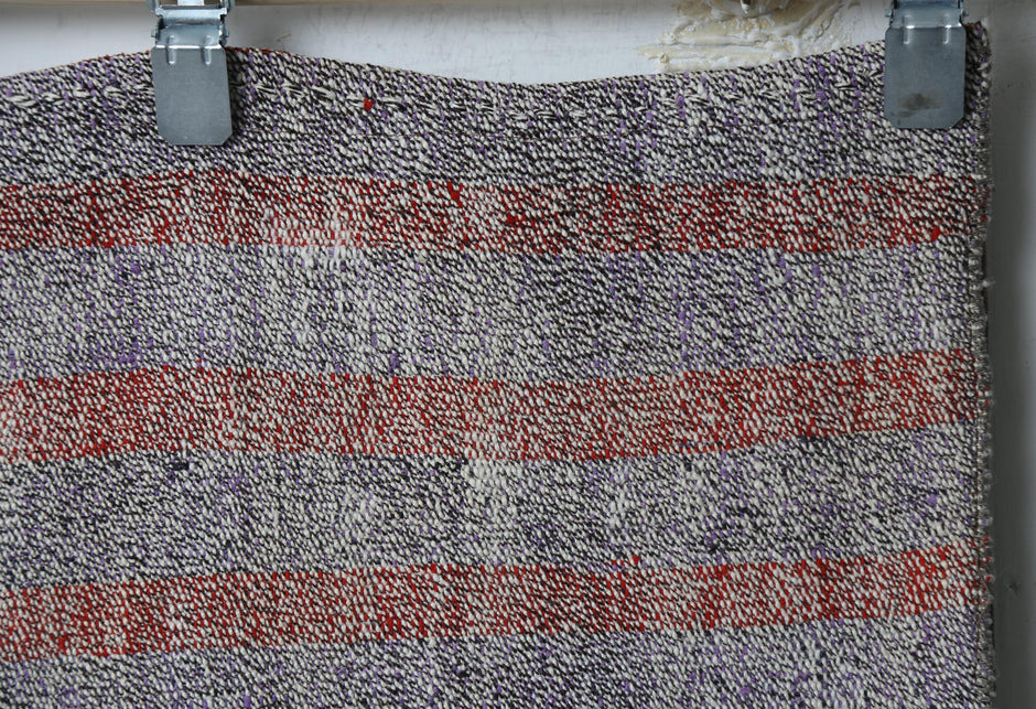 Side perspective, complete neutral flatweave runner