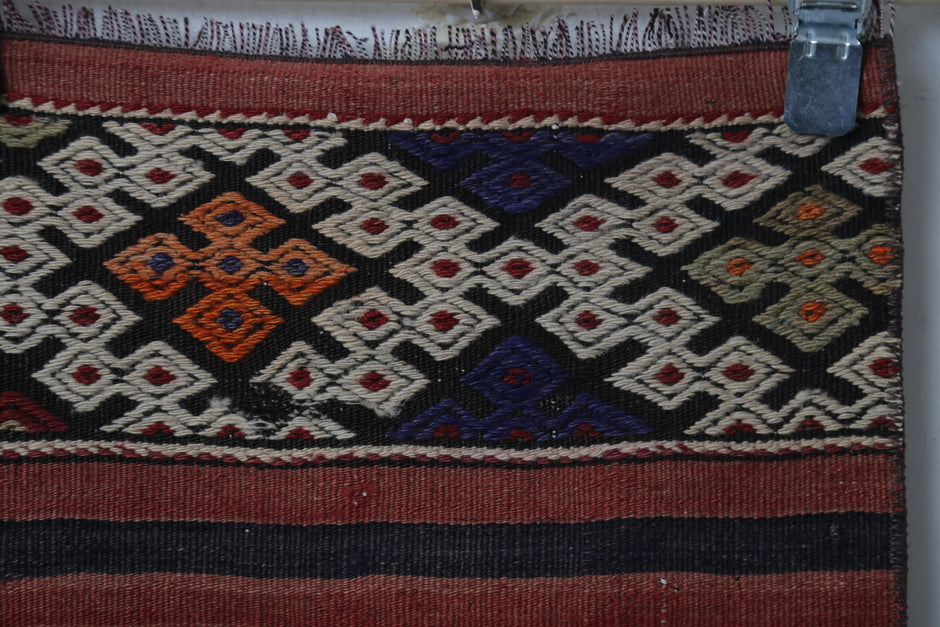 Side angle, color distribution, multicolor kilim rug