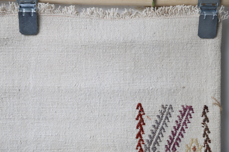 Side perspective, flatweave pattern, red brown kilim runner