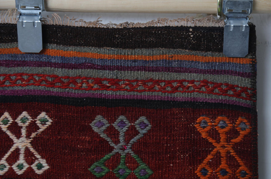 Handwoven wool texture detail, striped kilim runner
