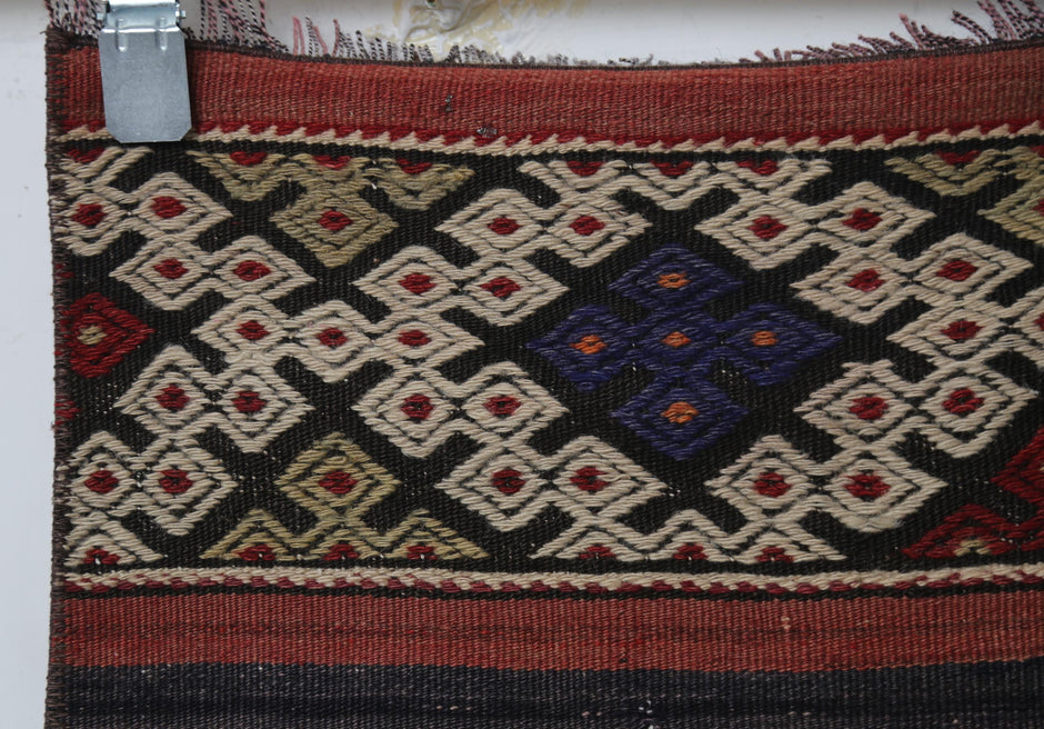Striped border pattern close-up, colorful kilim rug