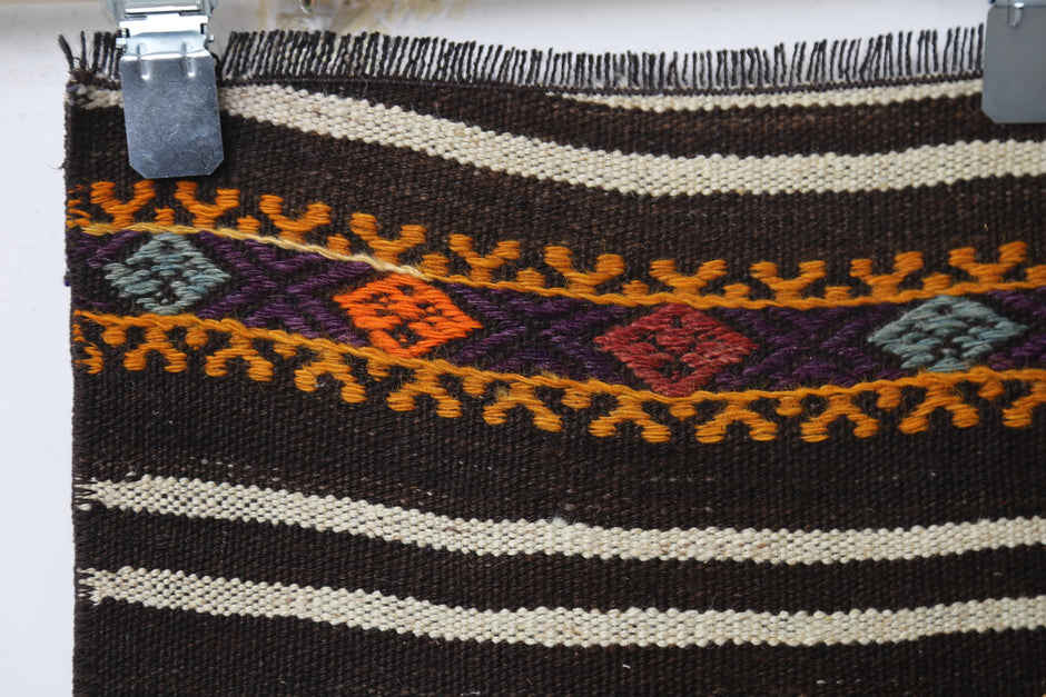 Tribal accent detail, alt angle, striped kilim runner