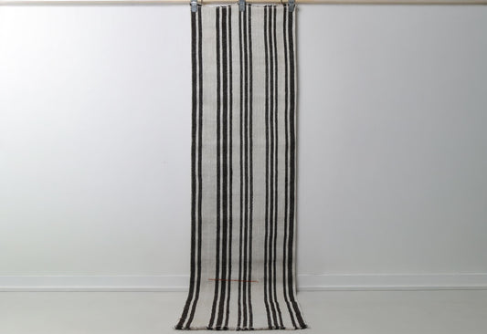 2'0 x 7'7 vintage Turkish hemp runner rug hanging showing white field with black vertical stripes