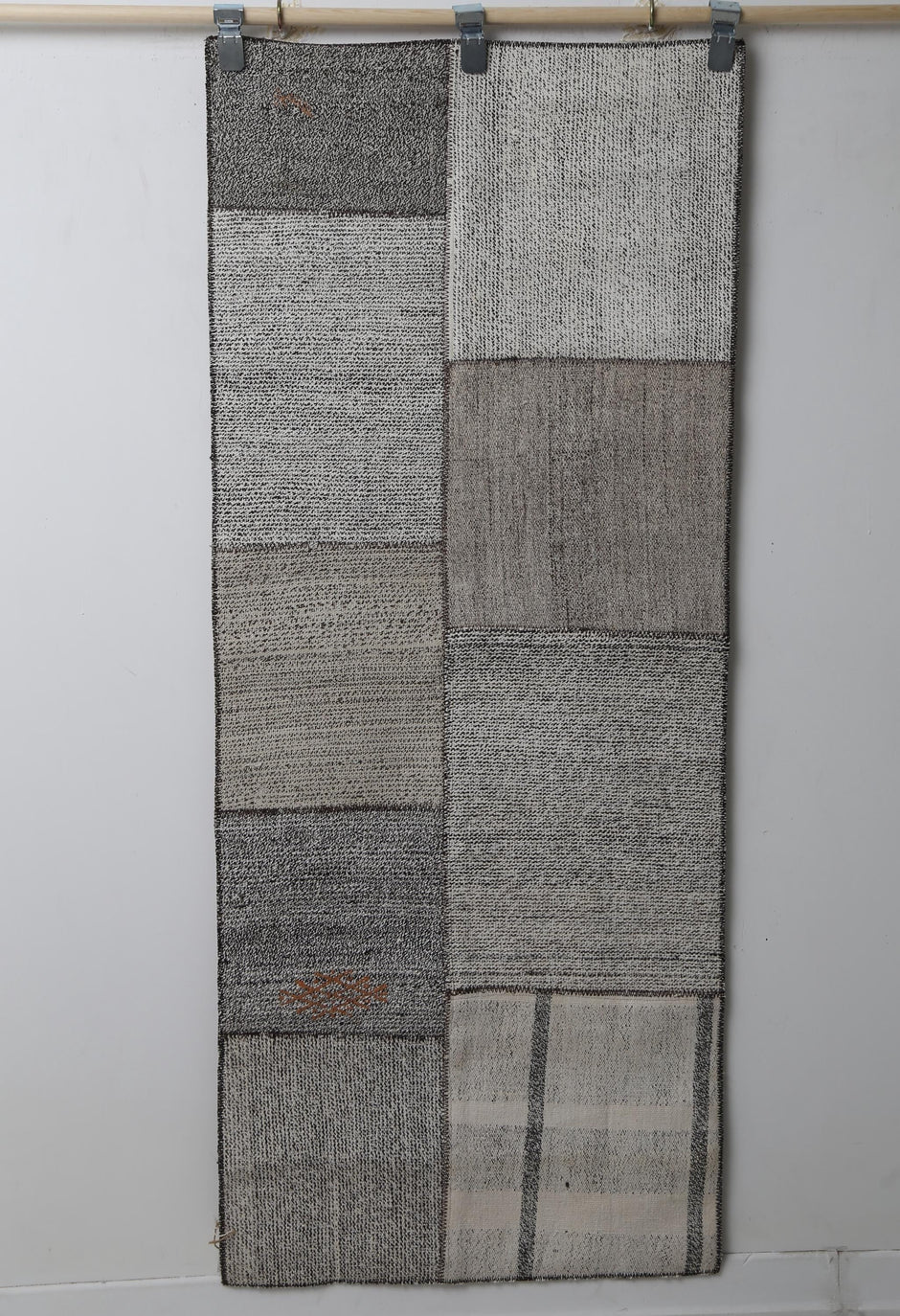 Patchwork kilim rug close-up, weave pattern detail