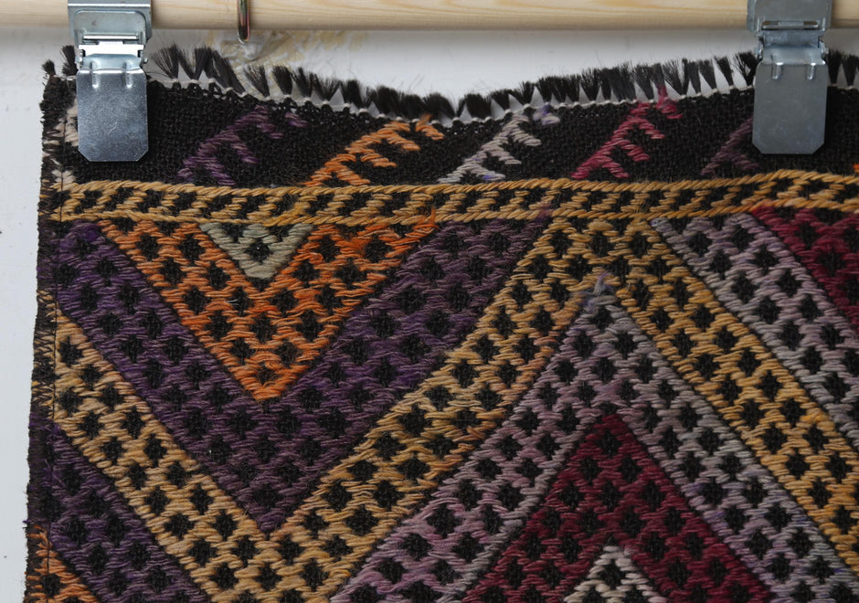 Handmade wool construction, alt angle, orange kilim runner