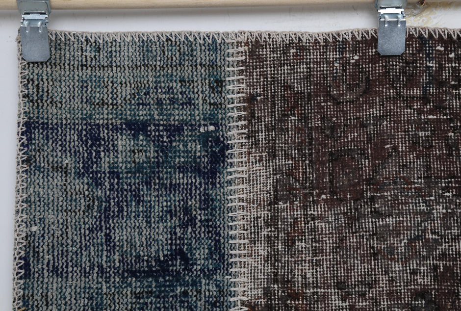 Handwoven texture, stitched seams, Turkish patchwork rug