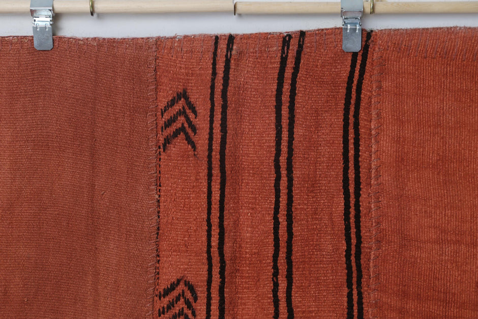 Aged hemp texture detail on handmade monochromatic area rug
