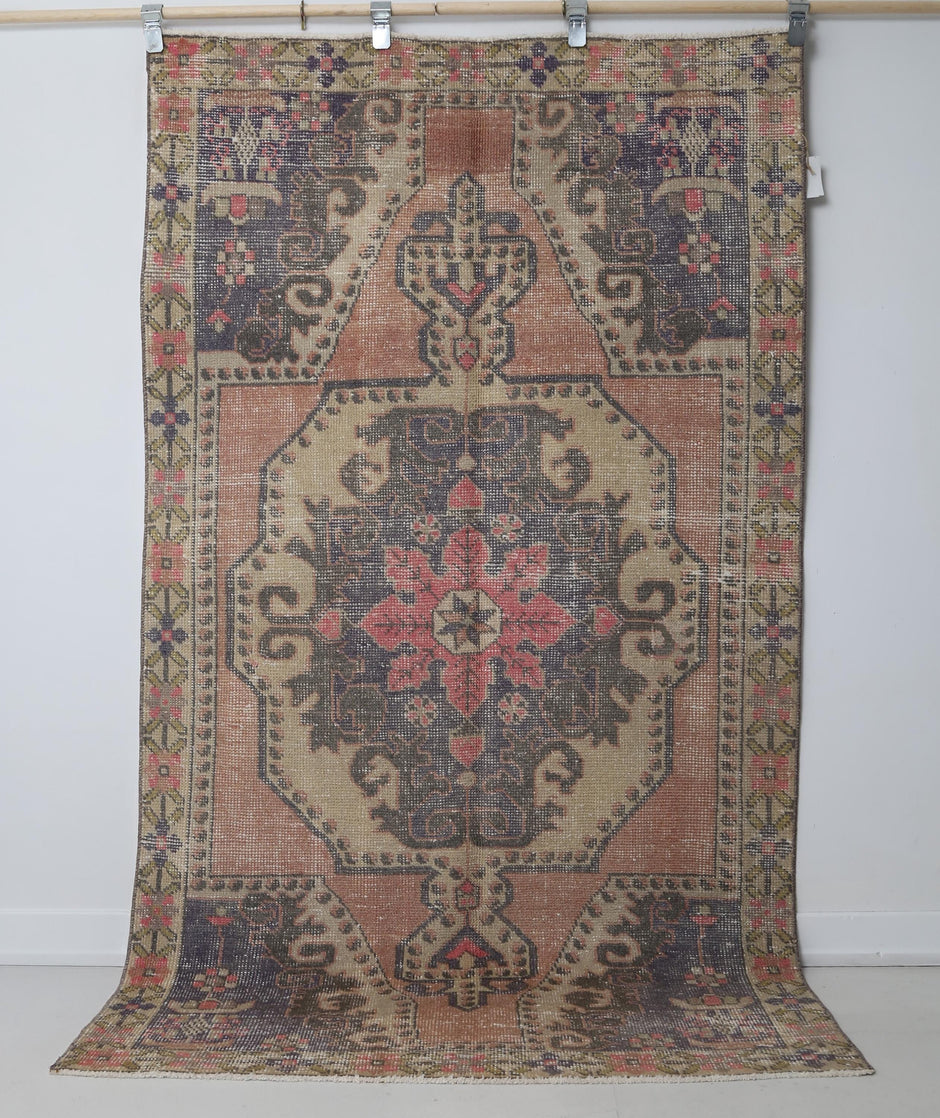 Distressed wool cotton texture detail on handmade traditional rug