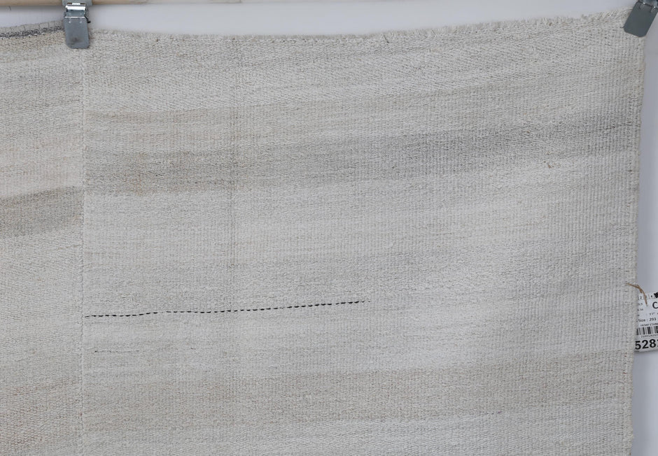 Natural hemp texture detail on handmade neutral area rug
