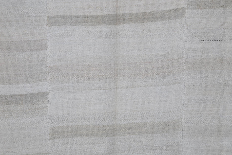 Vintage hemp flatweave rug displayed in Scandinavian living room
