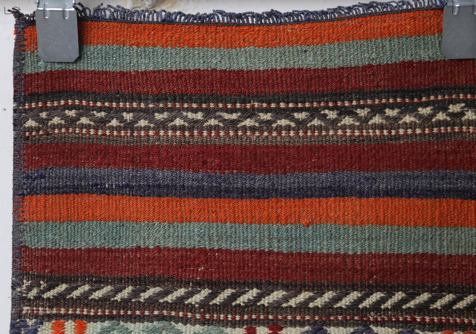 Flatweave wool texture close-up, tribal motifs, kilim runner