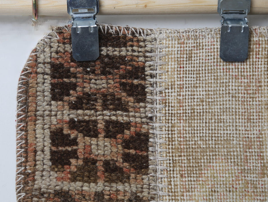 Side angle, patchwork doormat layout, multicolor rug
