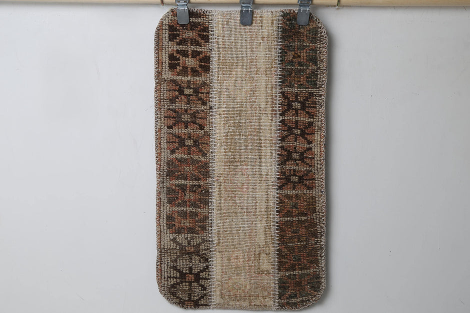 Patchwork doormat close-up, panel color variation detail
