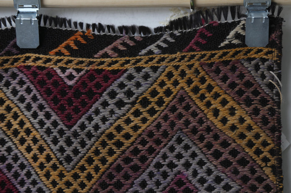 Side perspective, flatweave pattern, orange kilim runner