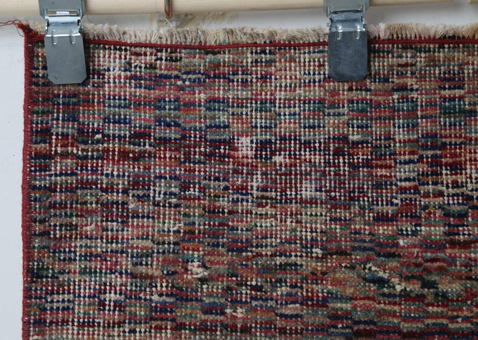 Minimal distressed design detail, alt angle, multicolor rug