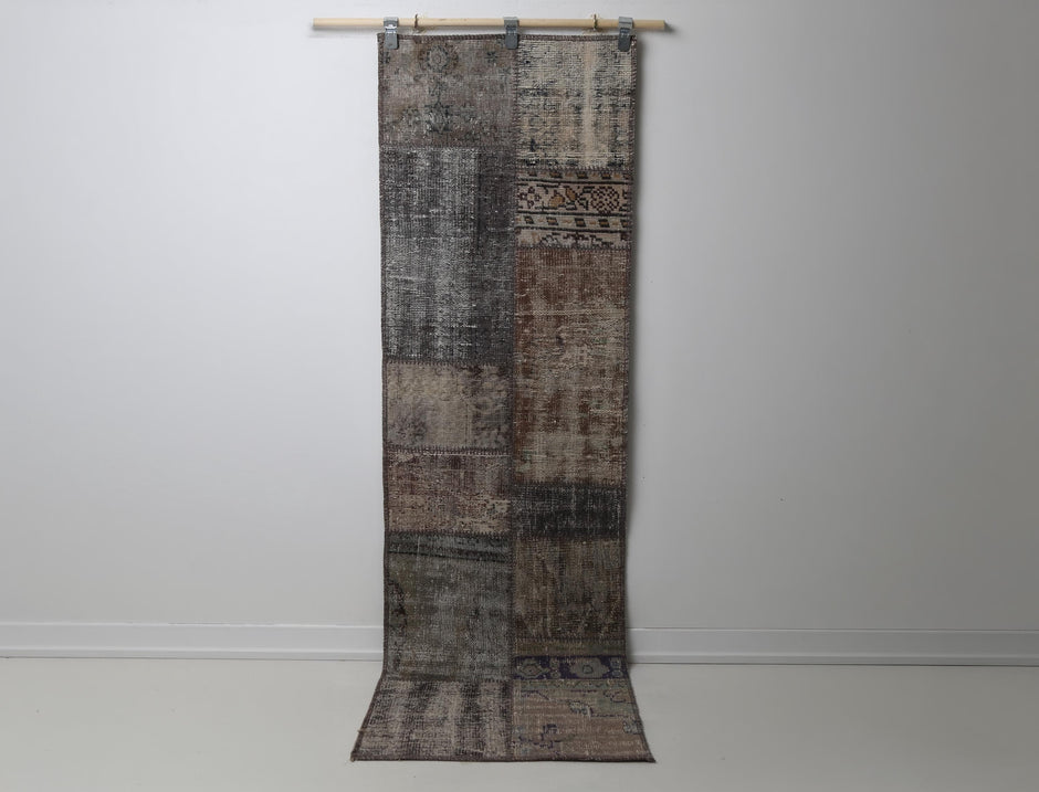 2'3" x 7'7" Vintage Turkish Patchwork Runner Rug, multicolor front view