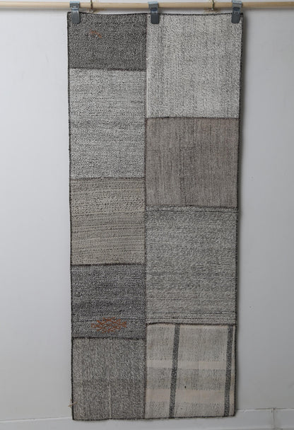 Patchwork kilim rug close-up, weave pattern detail