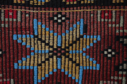 Woven pattern texture detail, red floral kilim runner