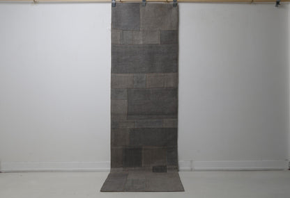 2'3 x 7'9 vintage Turkish hemp runner rug hanging showing solid dark gray patchwork panel design