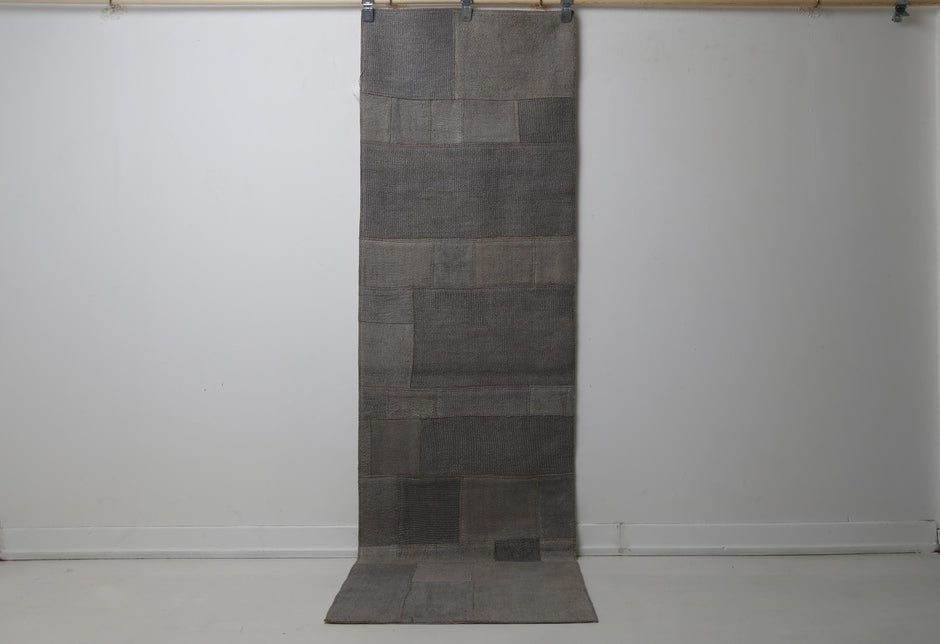 2'3 x 7'9 vintage Turkish hemp runner rug hanging showing solid dark gray patchwork panel design