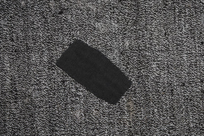 Back weave detail, handmade black white flatweave rug