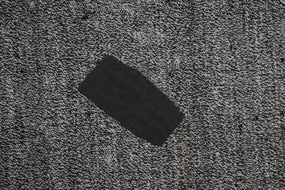 Back weave detail, handmade black white flatweave rug