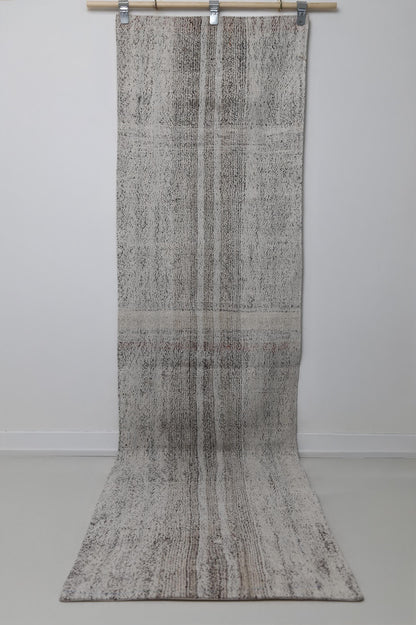 Black white striped runner rug close-up, weave texture
