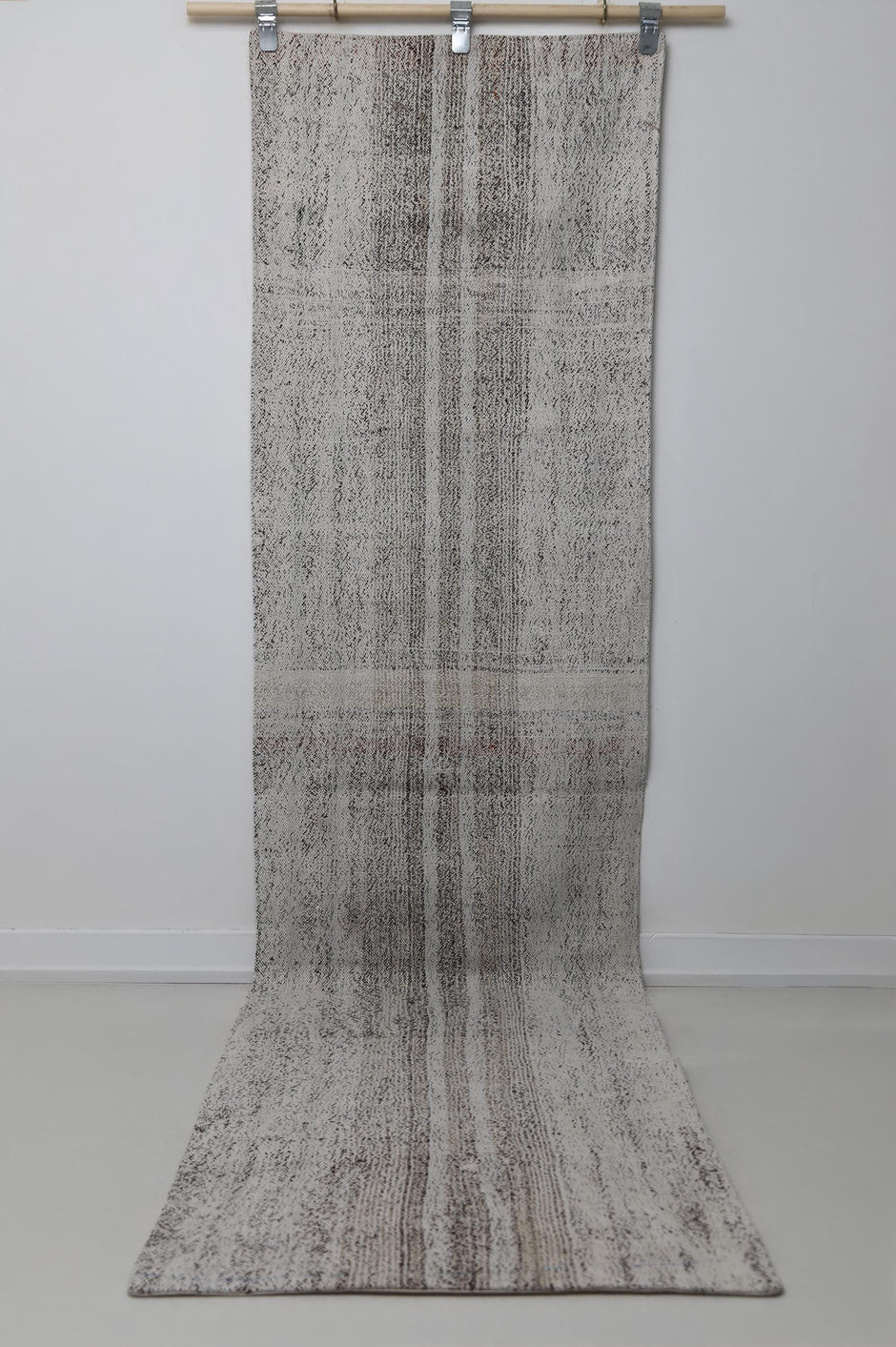 Black white striped runner rug close-up, weave texture