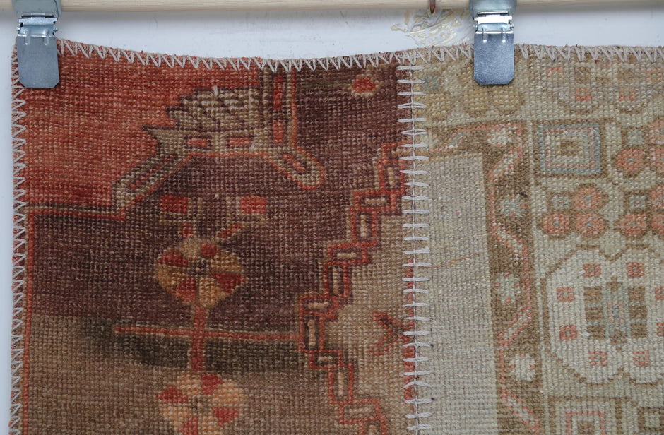 Distressed texture, stitched seams, handmade patchwork rug