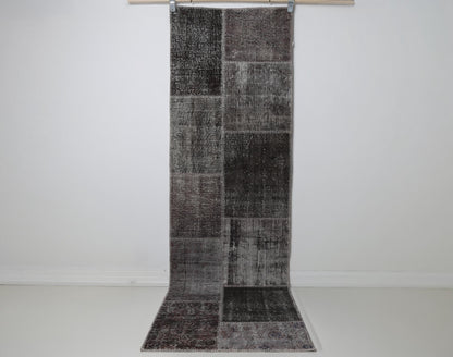2x8 vintage patchwork runner rug hanging showing full gray brown panel design