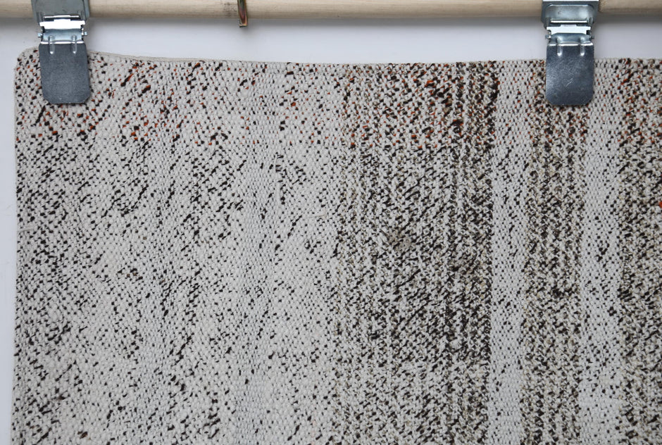 Side view, minimalist striped layout, flatweave runner