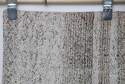 Side view, minimalist striped layout, flatweave runner