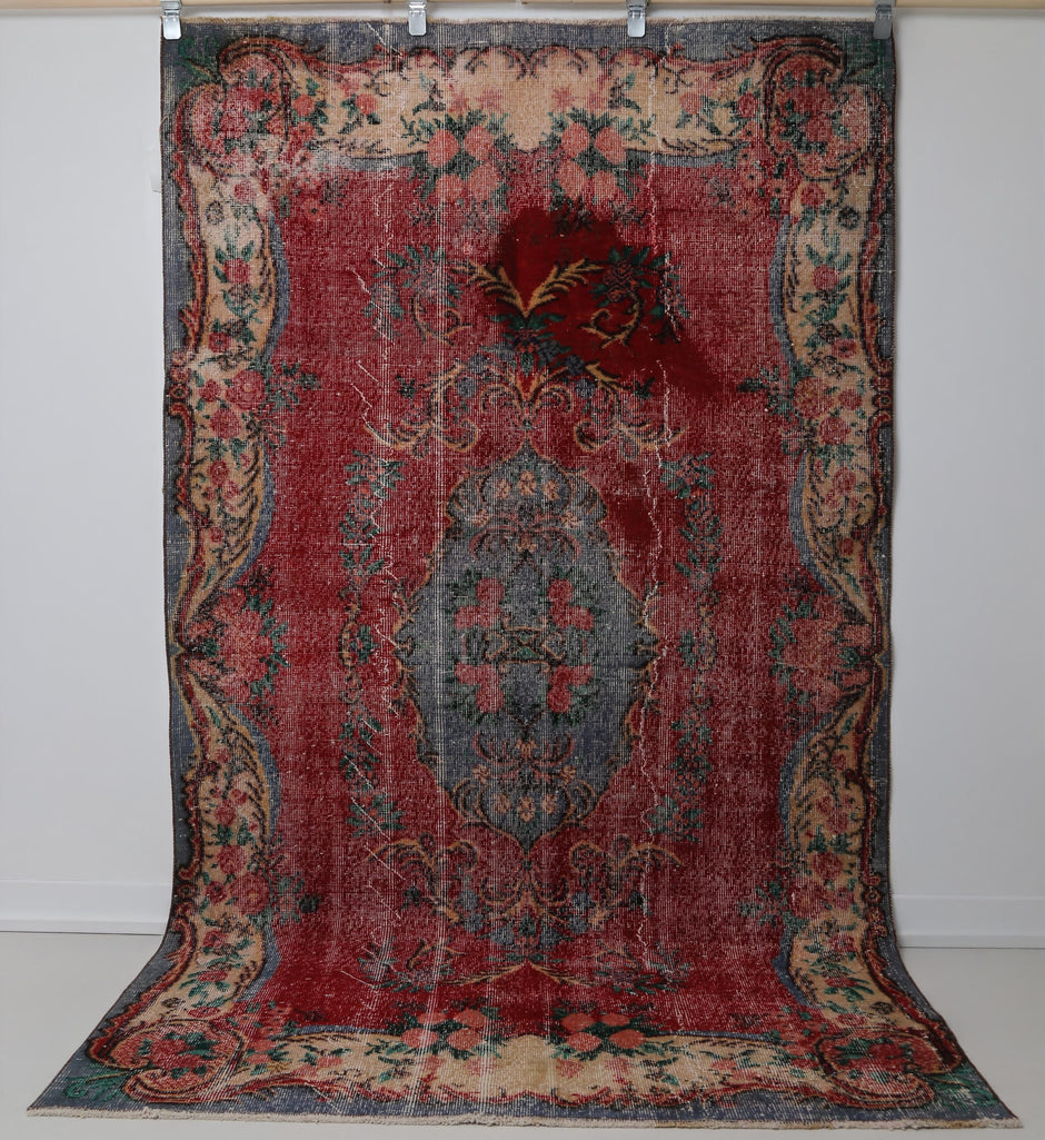 Distressed wool cotton texture detail on handmade traditional rug