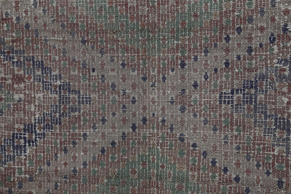Back side of handmade multicolor wool kilim rug showing flatweave texture