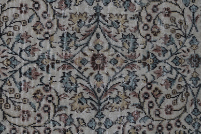 Handmade construction texture detail, distressed floral rug