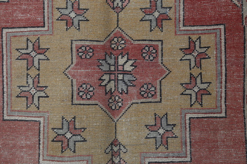 Vintage red yellow oriental runner displayed in classic hallway