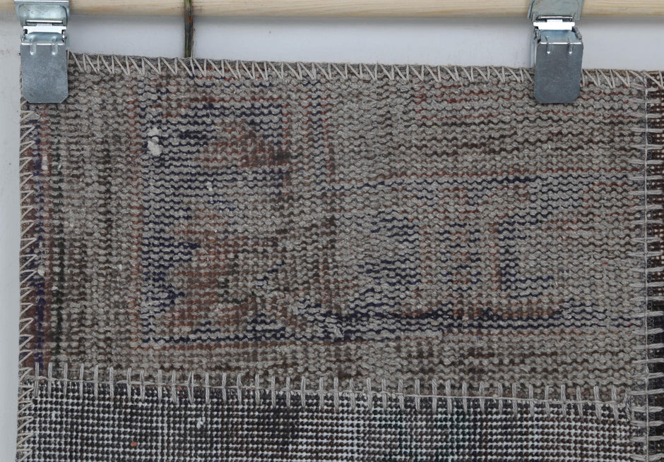 Muted traditional motif texture detail on handmade wool cotton runner