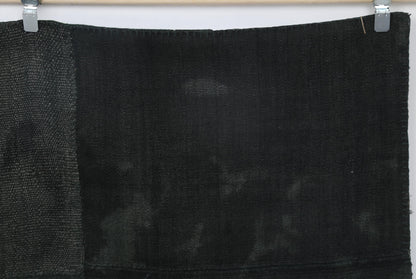 Natural hemp texture detail on handmade monochromatic area rug