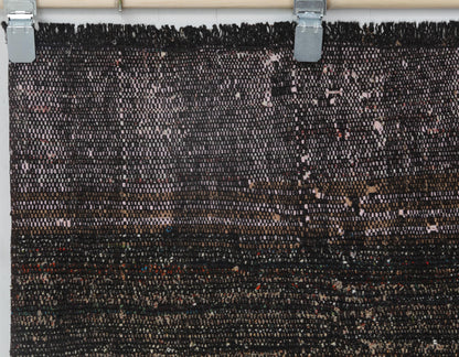 Textured flatweave surface detail on handmade wool cotton runner