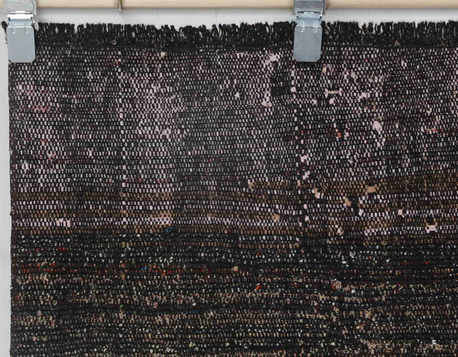 Textured flatweave surface detail on handmade wool cotton runner