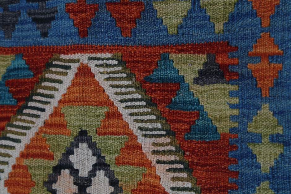 Back side of handmade blue multicolor kilim rug showing flatweave texture