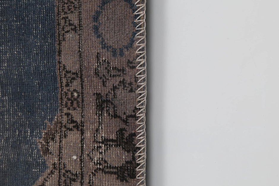 Back side of handmade multicolor wool cotton patchwork runner showing weave texture