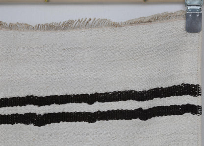 Vintage hemp runner rug displayed in hallway entryway setting