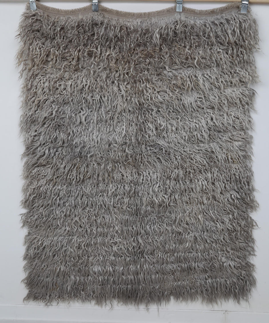 Close-up of long pile wool texture on vintage tulu rug